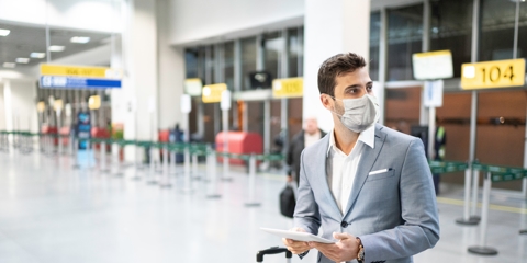 Businessman navigating an airport