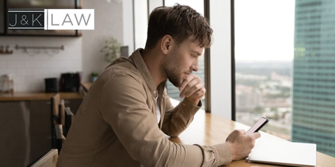 man looking at cellphone