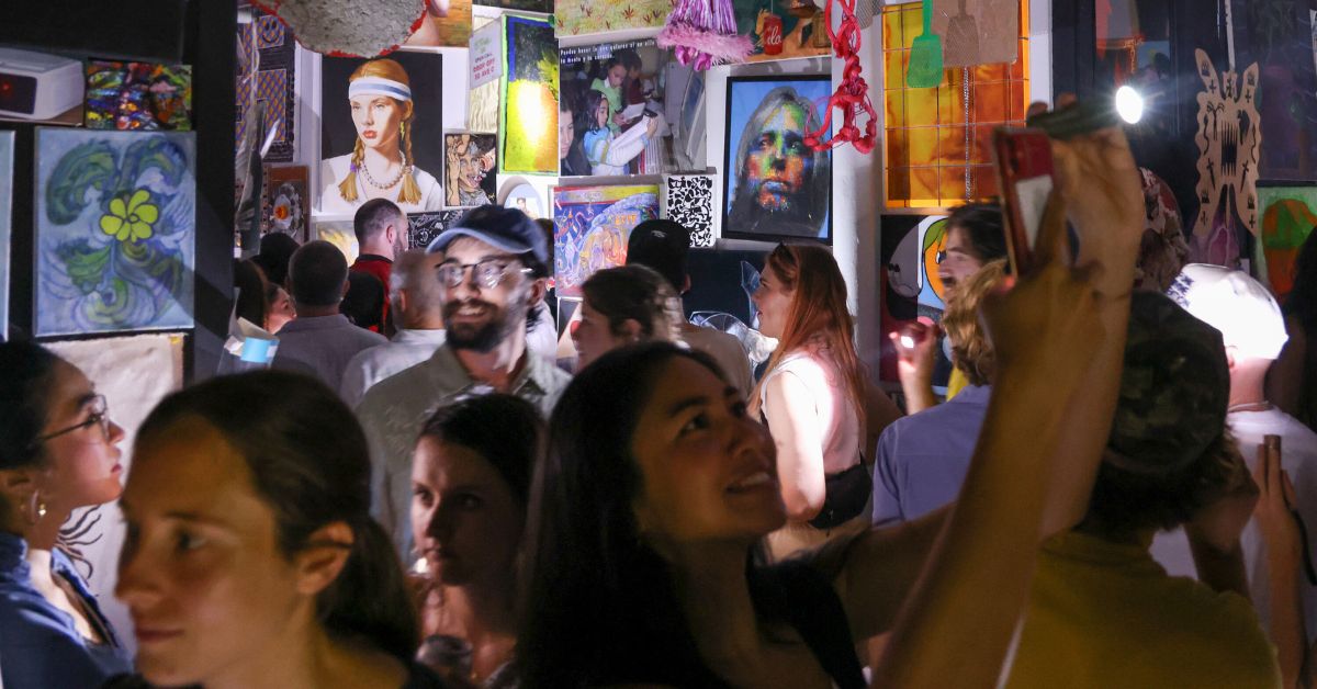 Crowd of people at art event