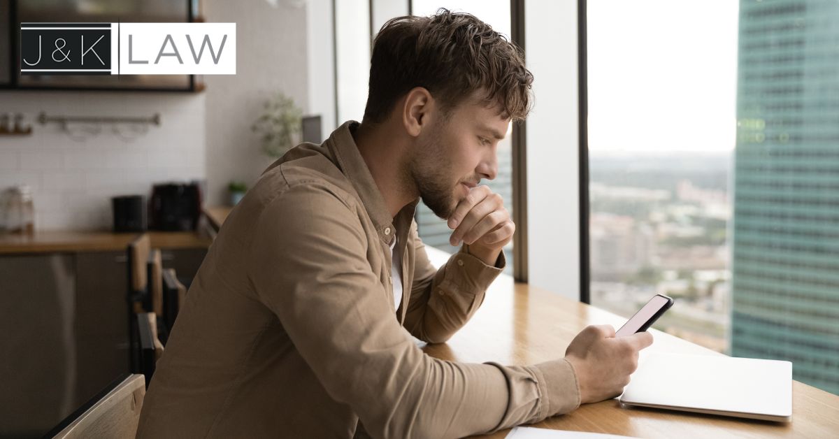 man looking at cellphone